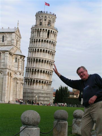 Dale holding up the Leaning Tower of Pisa